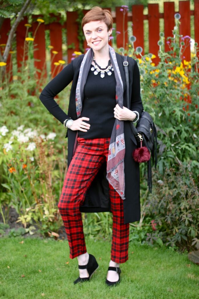 black and red tartan with statement